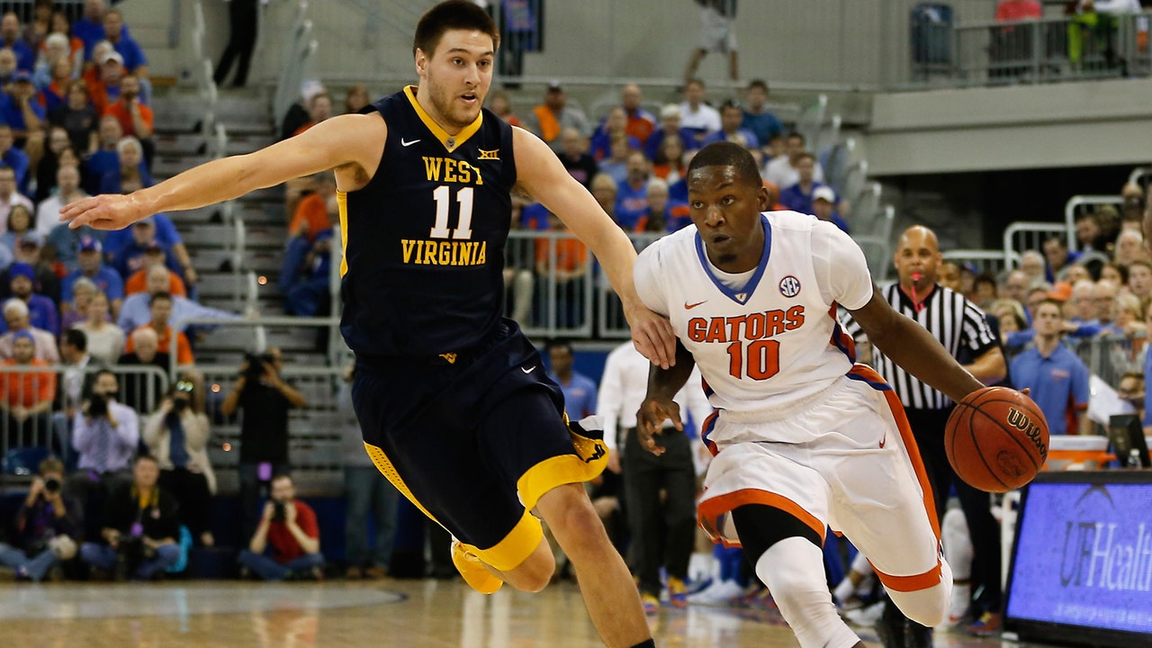 Dorian Finney-Smith leads way as Florida upsets West Virginia